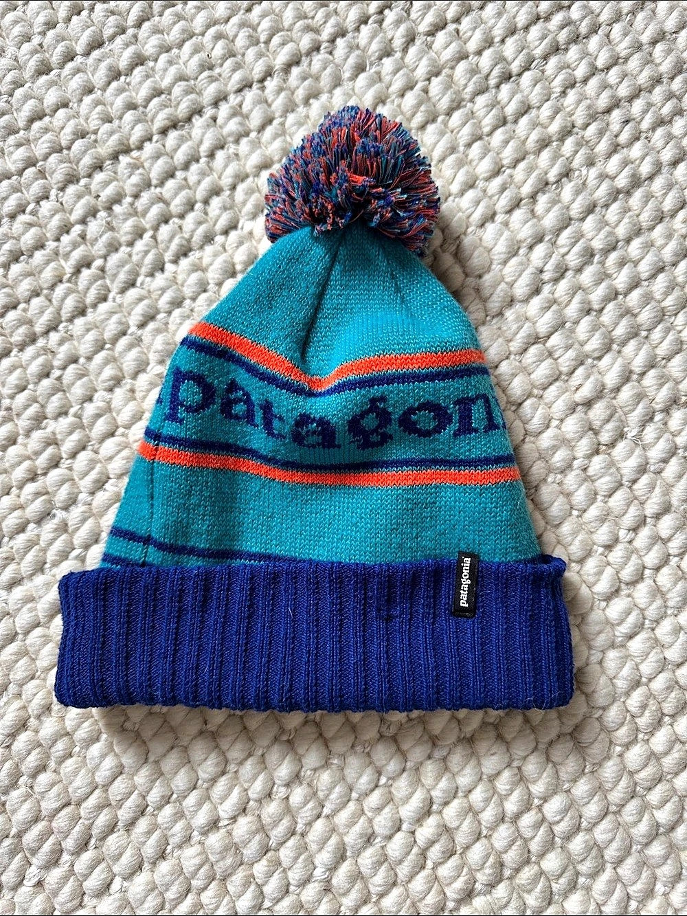 Patagonia Powder Town Beanie Striped Pom-Pom Beanie Blue & Orange
